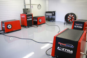 4WD Dynapack DAQ54 hub dyno for sale at XTRA Motorsport — dyno room with the Dynapack installed